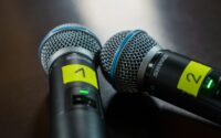 two microphones sitting next to each other on a table